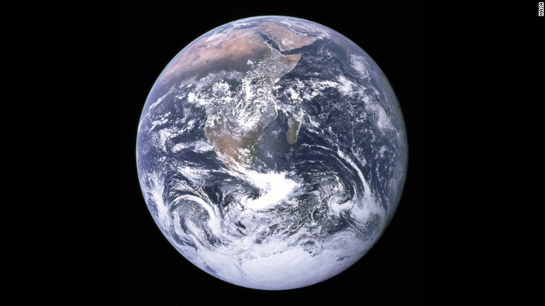 &quot;The Blue Marble&quot; is a famous photograph of the Earth taken on December 7, 1972, by the crew of the Apollo 17 spacecraft en route to the Moon at a distance of about 29,000 kilometers (18,000 miles). It shows Africa, Antarctica, and the Arabian Peninsula.