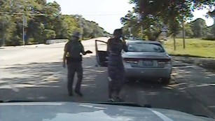 In this July 10, 2015, frame from dashcam video provided by the Texas Department of Public Safety, trooper Brian Encinia arrests Sandra Bland after she became combative during a routine traffic stop in Waller County, Texas.