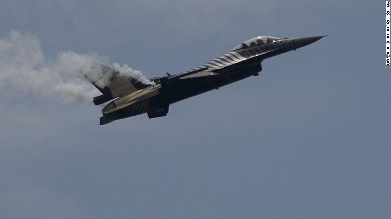 Caption:A Solo Turk F-16 of the Turkish Air Force performs during the Motril International Air Festival in Motril, near Granada, on June 21, 2015. AFP PHOTO/ JORGE GUERRERO (Photo credit should read Jorge Guerrero/AFP/Getty Images)