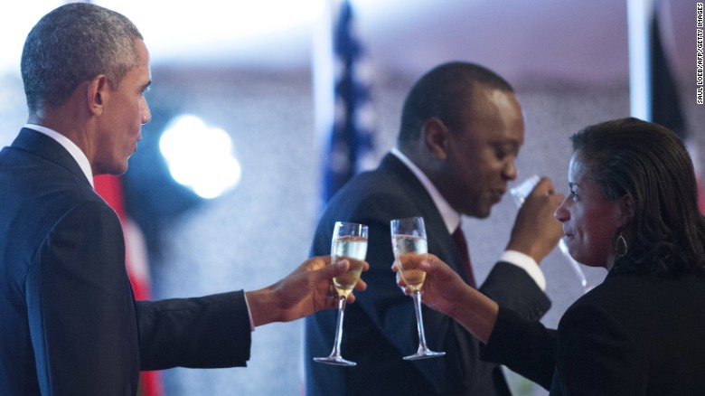 U.S. President Barack Obama and National Security Adviser Susan Rice share a toast during a state dinner hosted by Kenyan President Kenyatta at the State House in Nairobi, on Saturday, July 25.  Obama arrived in Kenya late on July 24, making his first visit as President to the country of his father&#39;s birth. Obama will travel to Ethiopia on Sunday, where he will attend bilateral meetings with Ethiopian and African Union leaders. 