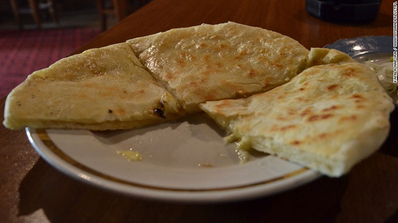 Khachapuri is a staple in Georgian cuisine. This famous cheese bread comes in a variety of shapes and forms, usually filled with Sulguni cheese, a brined cheese from the Samegrelo region. 