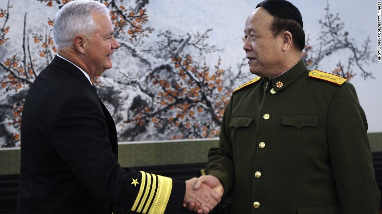Former U.S. Pacific commander Adm. Timothy Keating (L) shakes hand with General Guo Boxiong in 2008.