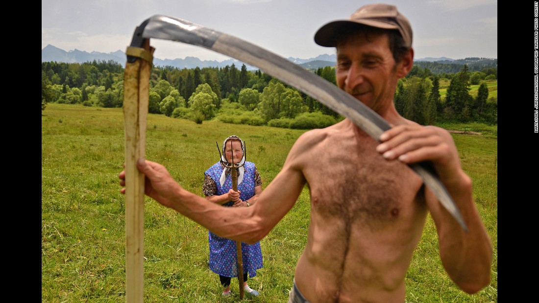 &quot;Traditional haymaking in Poland,&quot; Jurecki said. &quot;Many people continue to use the scythe and pitchfork to sort the hay.&quot;