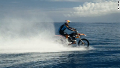 Motocross star surfs big waves on his bike - CNN Video