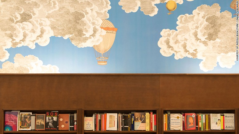 The new Rizzoli Bookstore features wallpaper exclusively designed by Fornasetti Milano. 
