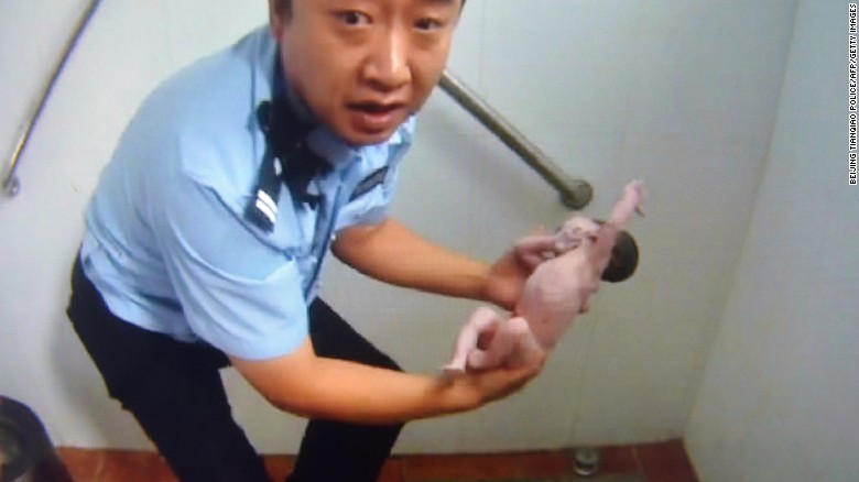 Newborn baby pulled alive from toilet in Beijing