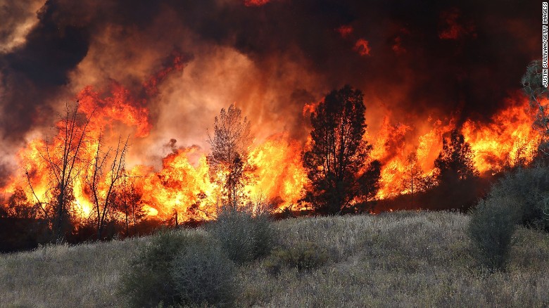 Firefighters used a backfire to try to head off the Rocky Fire on Monday near Clearlake, California.