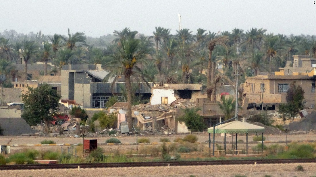 Buildings reduced to piles of debris can be seen in the eastern suburbs of Ramadi on August 6.
