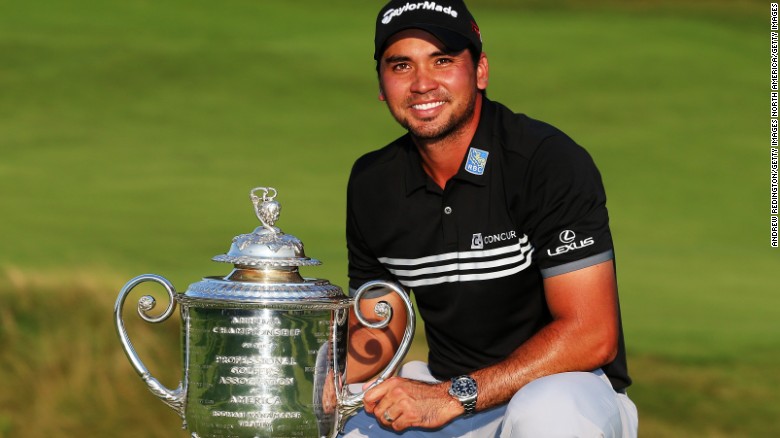 Jason Day of Australia poses with the Wanamaker trophy after winning the 2015 PGA Championship.