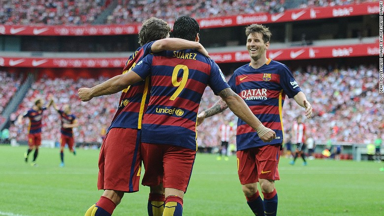 BILBAO, SPAIN - AUGUST 23:  Luis Suarez of FC Barcelona celebrates with Lionel Messi and Sergi Roberto after scoring Barcelona opening goal during the La Liga match between Athletic Club and FC Barcelona at San Mames Stadium on August 23, 2015 in Bilbao, Spain.  (Photo by Denis Doyle/Getty Images)