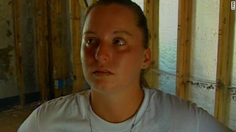 Laura Bane in 2005 speaks to Cooper in Waveland, Mississippi, after she lost her parents and her two brothers to the storm.