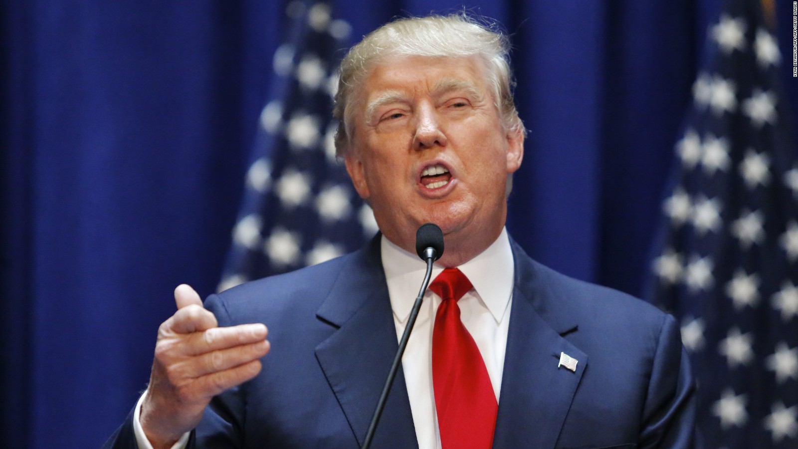 Real estate mogul Donald Trump announces his bid for the presidency in the 2016 presidential race during an event at the Trump Tower on the Fifth Avenue in New York City on June 16, 2015. Trump, one of America's most flamboyant and outspoken billionaires, threw his hat into the race Tuesday for the White House, promising to make America great again. The 69-year-old long-shot candidate ridiculed the country's current crop of politicians and vowed to take on the growing might of China in a speech launching his run for the presidency in 2016. "I am officially running for president of the United States and we are going to make our country great again," he said from a podium bedecked in US flags at Trump Tower on New York's Fifth Avenue. The tycoon strode onto the stage after sailing down an escalator to the strains of "Rockin' In The Free World" by Canadian singer Neil Young after being introduced by daughter Ivanka. His announcement follows years of speculation that the man known to millions as the bouffant-haired host of American reality TV game show "The Apprentice" would one day enter politics. Trump identifies himself as a Republican, and has supported Republican candidates in the past. But in his announcement speech he did not explicitly say if he was running for the party's nomination or as an independent.AFP PHOTO/ KENA BETANCUR (Photo credit should read KENA BETANCUR/AFP/Getty Images)