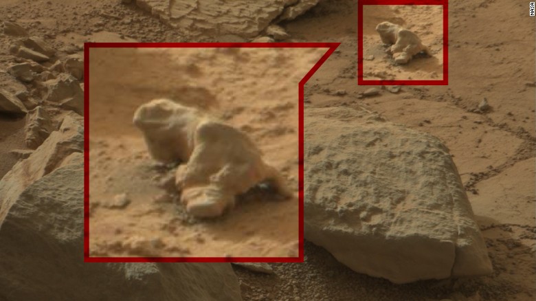 When is a rock more than just a rock? When it&#39;s an iguana, of course. Conspiracy theorists have been trawling through photos taken by NASA&#39;s Curiosity rover and pointing out mysterious objects that they say are proof of life on Mars.