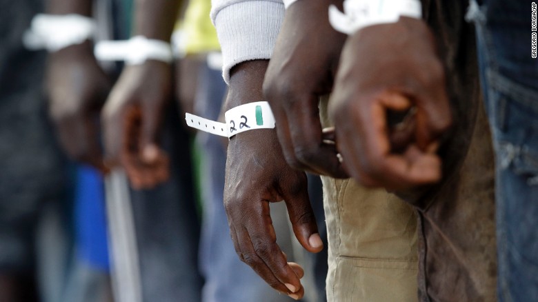 Migrants wear identification bracelets aboard a Norwegian ship during a search-and-rescue mission off the Libyan coast on Tuesday, September 1. Europe is in the midst of a migration crisis. Desperate men and women, often with children in tow, are fleeing wars and poverty to find a better life on the continent. But their voyages, both on land and on sea, can be dangerous and sometimes deadly.