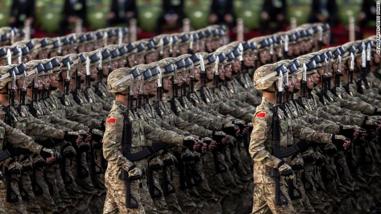 Chinese soldiers march past Tiananmen Square on September 3.