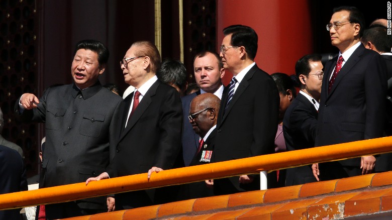 Chinese President Xi Jinping, left, stands with former Chinese Presidents Jiang Zemin and Hu Jintao and current Premier Li Keqiang at the military parade in Beijing on September 3.