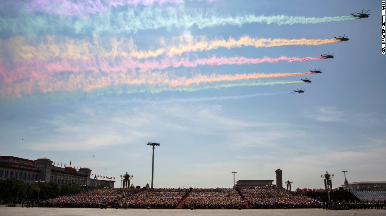 Chinese military helicopters fly in formation over Tiananmen Square on September 3, 2015 in Beijing, China. A massive military parade in Tiananmen Square marked the 70th anniversary of victory over Japan and the end of World War II.