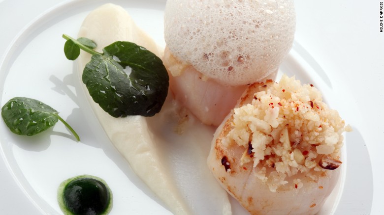 On the menu: Scallops with cauliflower and hazelnut couscous, cauliflower mousseline, garlic emulsion and parsley jus. 