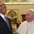 Pope Francis (C) and US President Barack Obama exchange gifts during a private audience on March 27, 2014 at the Vatican. The meeting at the Vatican comes as a welcome rest-stop for Obama during a six-day European tour dominated by the crisis over Crimea, and the US leader will doubtless be hoping some of the pope's overwhelming popularity will rub off on him.