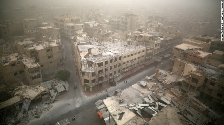 A picture taken on September 7, 2015 shows a general view of damaged buildings in the rebel-held area of Douma, east of Damascus, Syria.