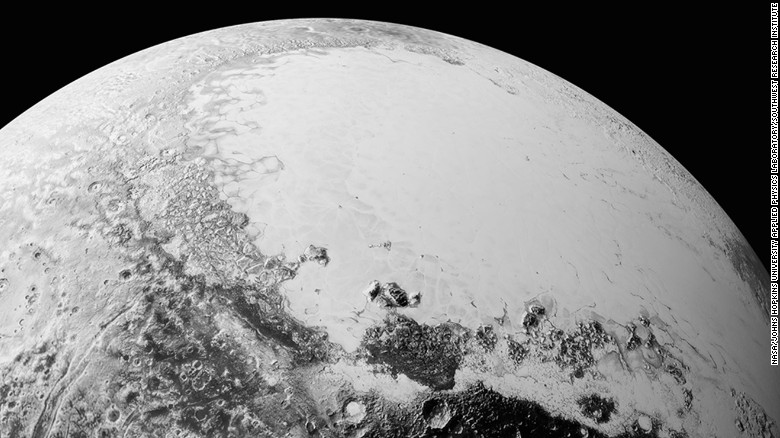 This picture is a synthesis of new high-resolution images downlinked from New Horizons. The broad icy plains have been nicknamed Sputnik Planum. This image is from a perspective above Pluto&#39;s equatorial area. Astronomers began downlinking a data dump from the space craft over Labor Day weekend, September 5 to 7.