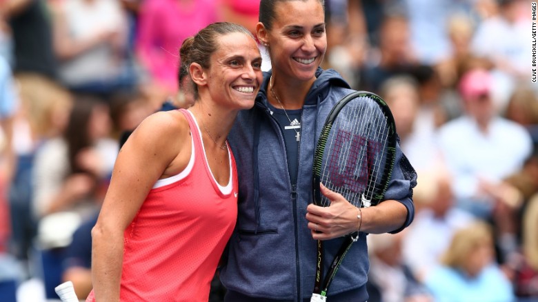 Vinci and  Pennetta pose for a photo prior to all-Italian final at Flushing Meadows in New York.