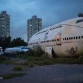 BANGKOK, THAILAND - SEPTEMBER 12:  Disused airplanes sit in a lot on September 12, 2015 in Bangkok, Thailand. 3 impoverished Thai families have begun living in disused airplanes on a private field. The families, who collect and recycle garbage earning a few dollars a day, can't afford to rent and prefer to stay in the planes.  (Photo by Taylor Weidman/Getty Images)