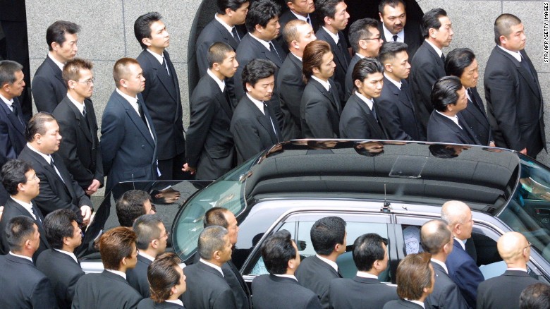 Yamaguchi-gumi members gather at their leader&#39;s funeral in Kobe, Japan.