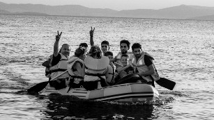 Immigrants from Pakistan are paddling to arrive at a beach on the island of Kos from the Turkish coast. Kos 12/08/2015