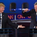 Republican presidential candidate, businessman Donald Trump, left, and Jeb Bush slap hands near the finish of the CNN Republican presidential debate at the Ronald Reagan Presidential Library and Museum on Wednesday, Sept. 16, 2015, in Simi Valley, Calif. (AP Photo/Mark J. Terrill)