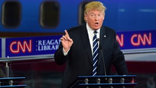 Republican presidential hopeful Donald Trump gestures during the Republican Presidential Debate at the Ronald Reagan Presidential Library in Simi Valley, California, September 16, 2015.