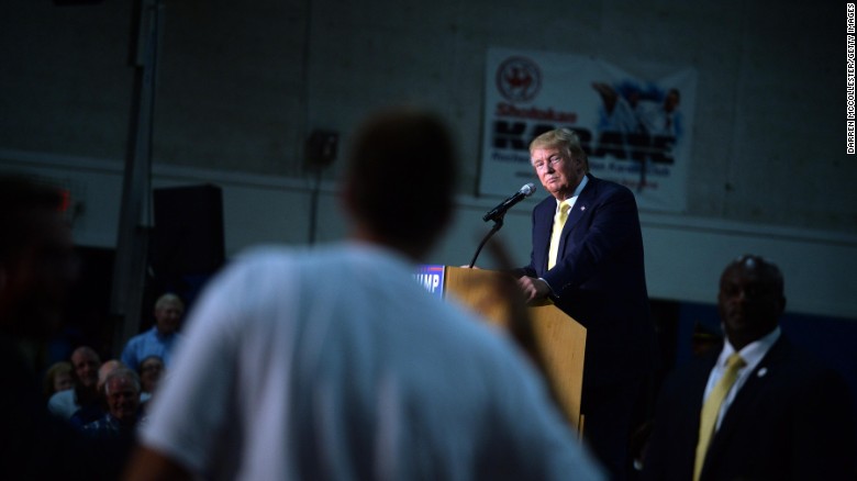 Republican presidential candidate Donald Trump listens to a question during a town hall event in Rochester, New Hampshire.