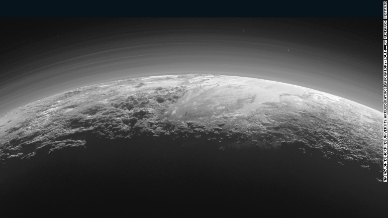 This image of the surface of Pluto was taken just 15 minutes after NASA&#39;s New Horizon spacecraft made its closest approach to the icy planet on July 14, 2015. As it looked toward the Sun, the spacecraft&#39;s camera captured more than dozen thin layers of haze in Pluto&#39;s atmosphere, at least 60 miles (100 kilometers) above the surface. The photo was downlinked to Earth on September 13, 2015.