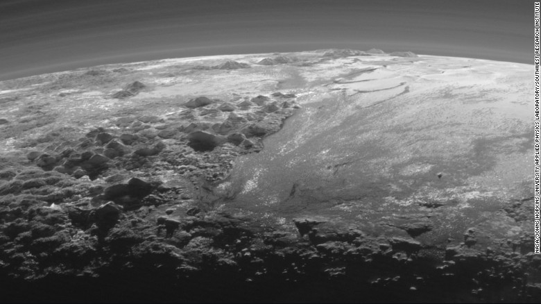 This image of Pluto&#39;s icy and mountainous landscapes was taken from a distance of 11,000 miles (17,700 kilometers). &quot;This image really makes you feel you are there, at Pluto, surveying the landscape for yourself,&quot; said New Horizons Principal Investigator Alan Stern, of the Southwest Research Institute in Colorado.