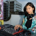 LONDON, ENGLAND - JULY 16:  Mimi Xu DJs at a rooftop party in Shoreditch, London, to celebrate the launch of Mary Katrantzou for adidas Originals Season 2 at Snap Studios on July 16, 2015 in London, England.  (Photo by David M. Benett/Dave Benett/Getty Images for Mary Katrantzou)