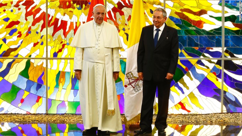 Pope Francis stands with Cuban President Raul Castro in the Revolution Palace in Havana, Cuba, on Sunday, September 20. The Pope arrived in Cuba on Saturday and is scheduled to travel to the United States on Tuesday, September 22. 