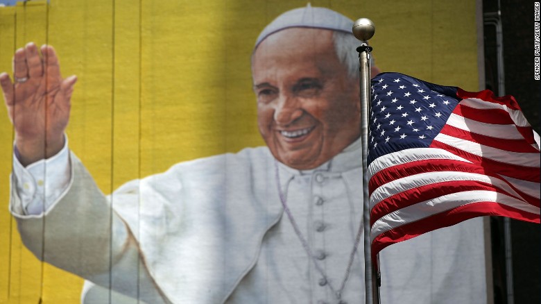 A mural of Pope Francis was painted on the side of a building in New York City.