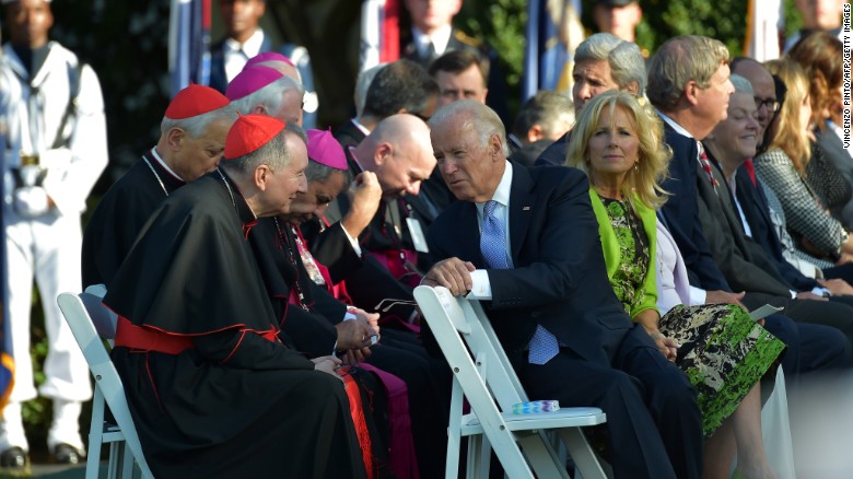 Vice President Joe Biden chats with clergy before Francis arrives at the White House.