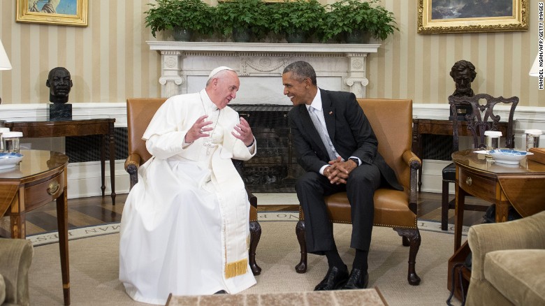President Barack Obama hosts the Pope in the Oval Office of the White House on September 23.