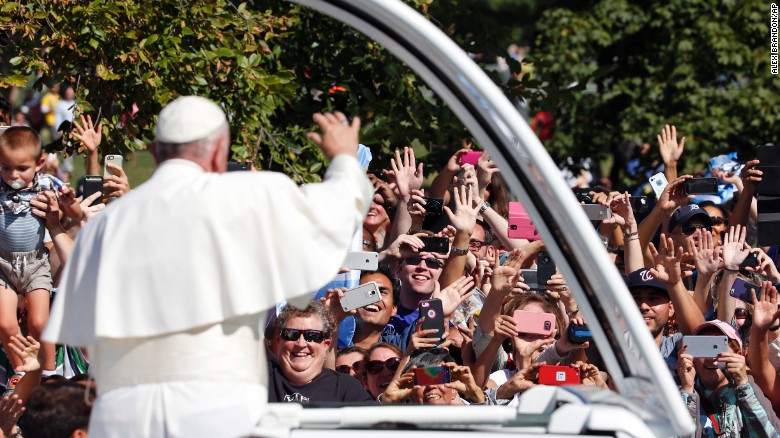 Pope Francis waves to the crowd during a parade in Washington on Wednesday, September 23. During his six-day stay in the United States, the Pope will also visit New York and Philadelphia.