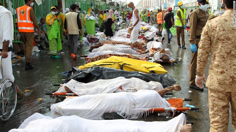 Saudi emergency personnel surround bodies of Hajj pilgrims at the site of a stampede Thursday, September 24, in Mecca, Islam's holiest city. Thursday morning's stampede killed hundreds during one of the last rituals of the<a href="http://www.cnn.com/2015/09/23/world/gallery/hajj/index.html"> Hajj, the annual Islamic pilgrimage</a>.