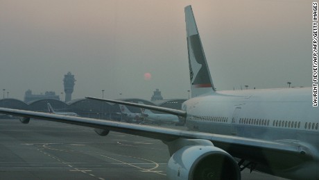 A Cathay Pacific Airbus A330 airplane sits on the tarmac at Hong Kong International Airport, 05 October 2007.    AFP PHOTO / LAURENT FIEVET (Photo credit should read LAURENT FIEVET/AFP/Getty Images)