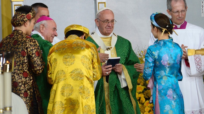 Pope Francis greets families at the conclusion of Mass at the World Meeting of Families at Benjamin Franklin Parkway in Philadelphia on September 27. 