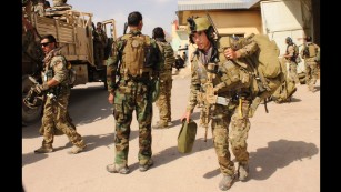 Afghan special forces prepare to launch an operation to retake the city of Kunduz, Afghanistan, from Taliban insurgents on Tuesday, September 29. The Taliban took control of most of the city the day before in its biggest victory since 2001.