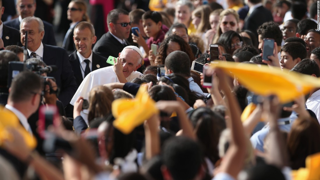 Children take selfies with Pope Francis as he arrives at a Catholic school in New York City on Friday, September 25. &lt;a href=&quot;http://www.cnn.com/2015/09/22/us/gallery/pope-francis-visits-united-states/index.html&quot; target=&quot;_blank&quot;&gt;See more photos from the Pope&#39;s trip to the United States&lt;/a&gt;