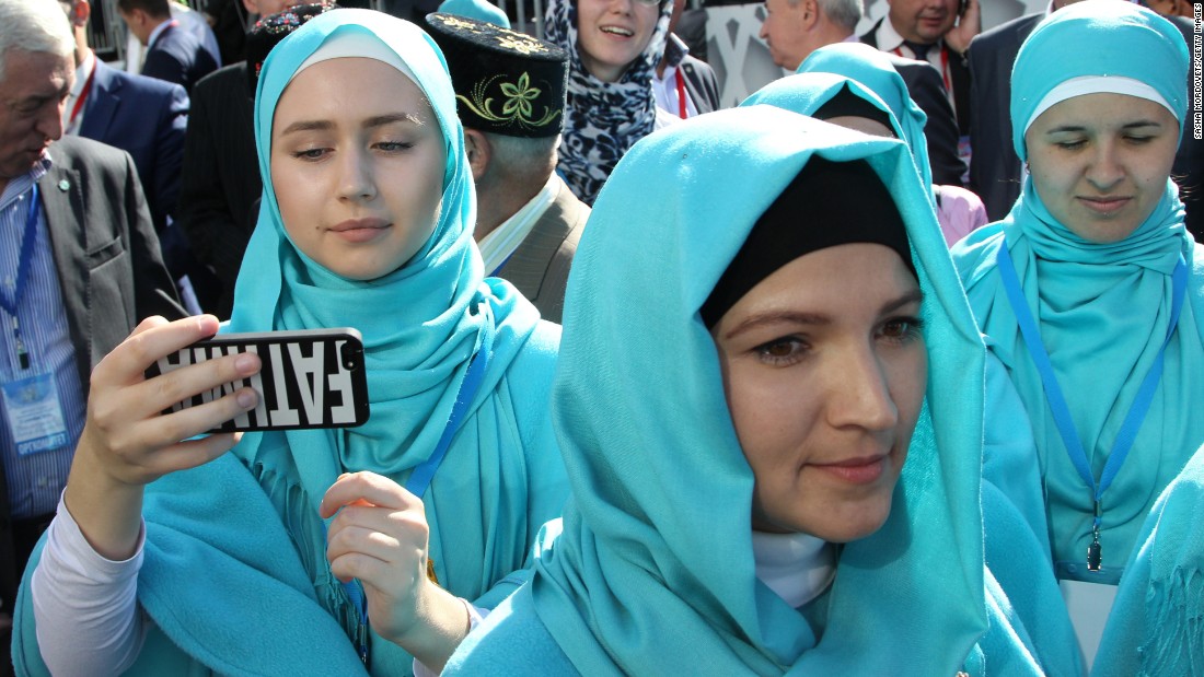 A young woman takes a selfie during the opening ceremony for &lt;a href=&quot;http://www.cnn.com/2015/09/23/europe/huge-mosque-opens-in-moscow/&quot; target=&quot;_blank&quot;&gt;the new Moscow Cathedral Mosque&lt;/a&gt; on Wednesday, September 23.