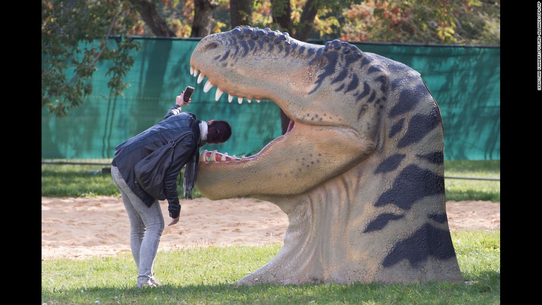 A visitor takes a selfie at the World of Dinosaurs exhibit in Erfurt, Germany, on Saturday, September 26. &lt;a href=&quot;http://www.cnn.com/2015/09/23/living/gallery/look-at-me-selfies-0923/index.html&quot; target=&quot;_blank&quot;&gt;See 32 selfies from last week&lt;/a&gt;