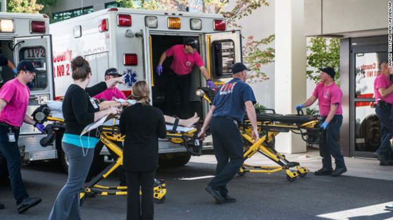 A patient is wheeled into the emergency room at Mercy Medical Center in Roseburg on October 1. 