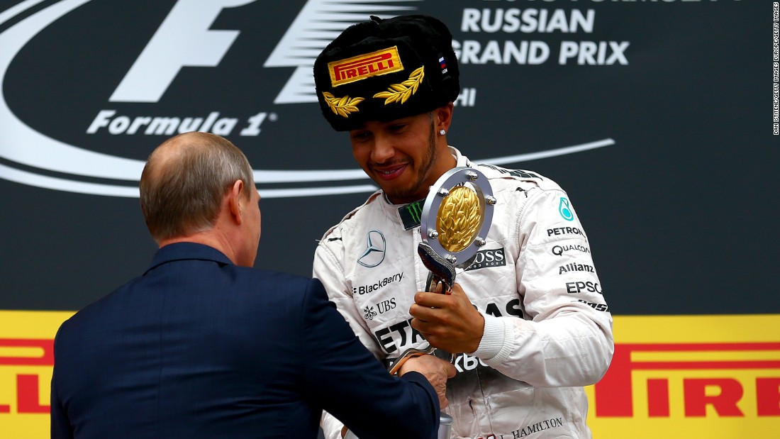 Putin presented Hamilton with the winner&#39;s trophy at the 2015 Russian Grand Prix. 