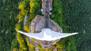 One of my favorite activities is to take the drone for hiking trips in nature. On this day, after a walk of two hours, I arrived at the feet of the Christ the Redeemer statue. The evening and the beautiful sun beating on the back of the statue, created the perfect combination for this photo.